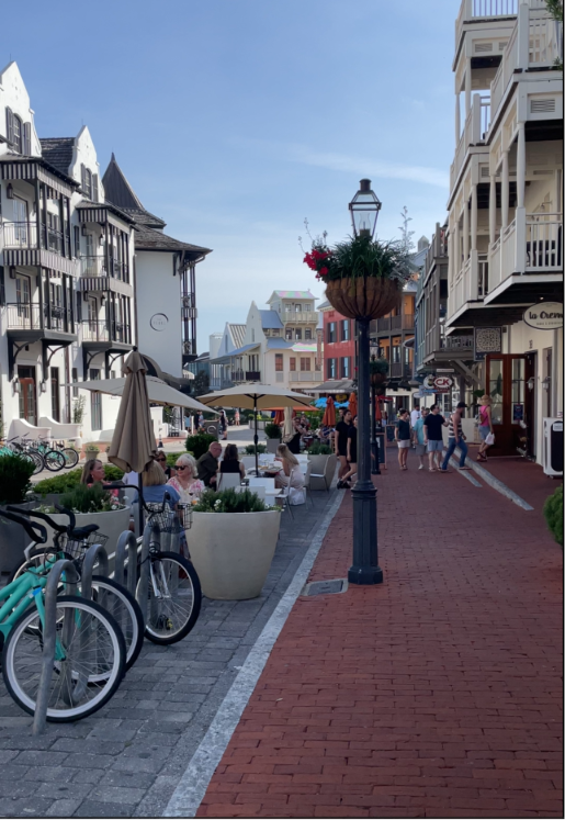 Boutique shops and storefronts in a 30A beach town used to compare shopping in Rosemary Beach vs Seaside vs Alys Beach