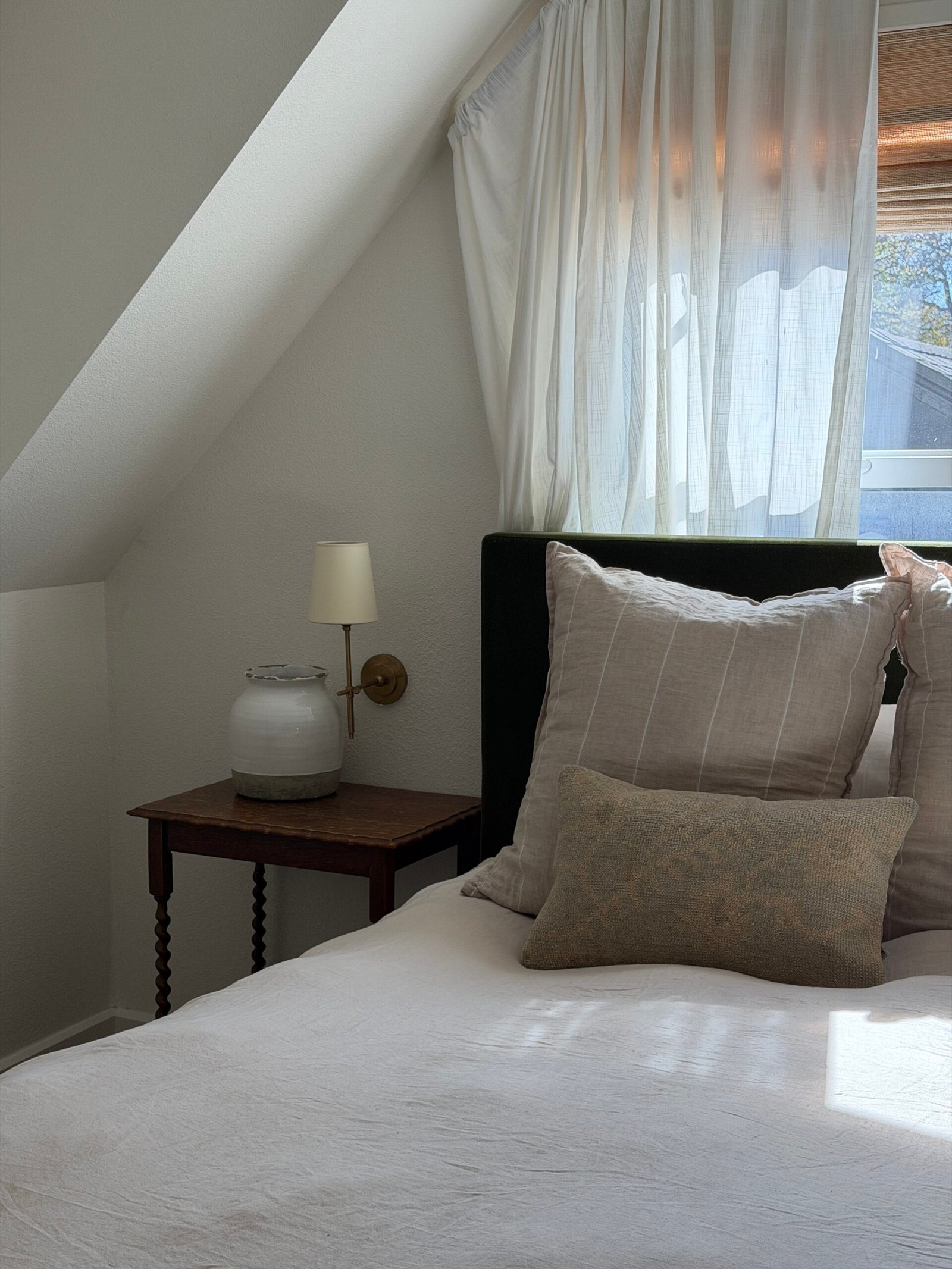 Photo of a light and airy bedroom bringing home the feeling of being at the beach and on the coast.