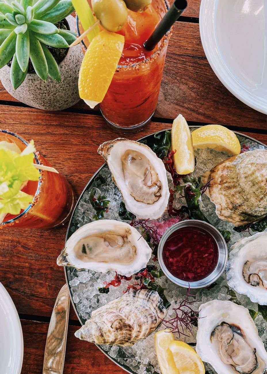 seafood on plate used to compare dining in Rosemary Beach vs Seaside vs Alys Beach