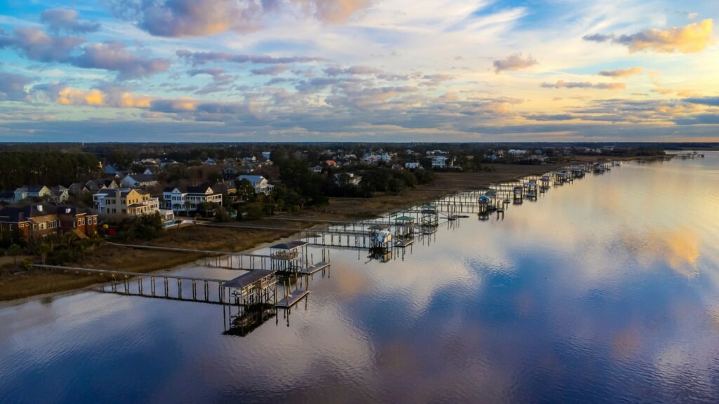 Homes on a bay near Charleston South Carolina at sunset to show the landscape for a Charleston Travel Guide